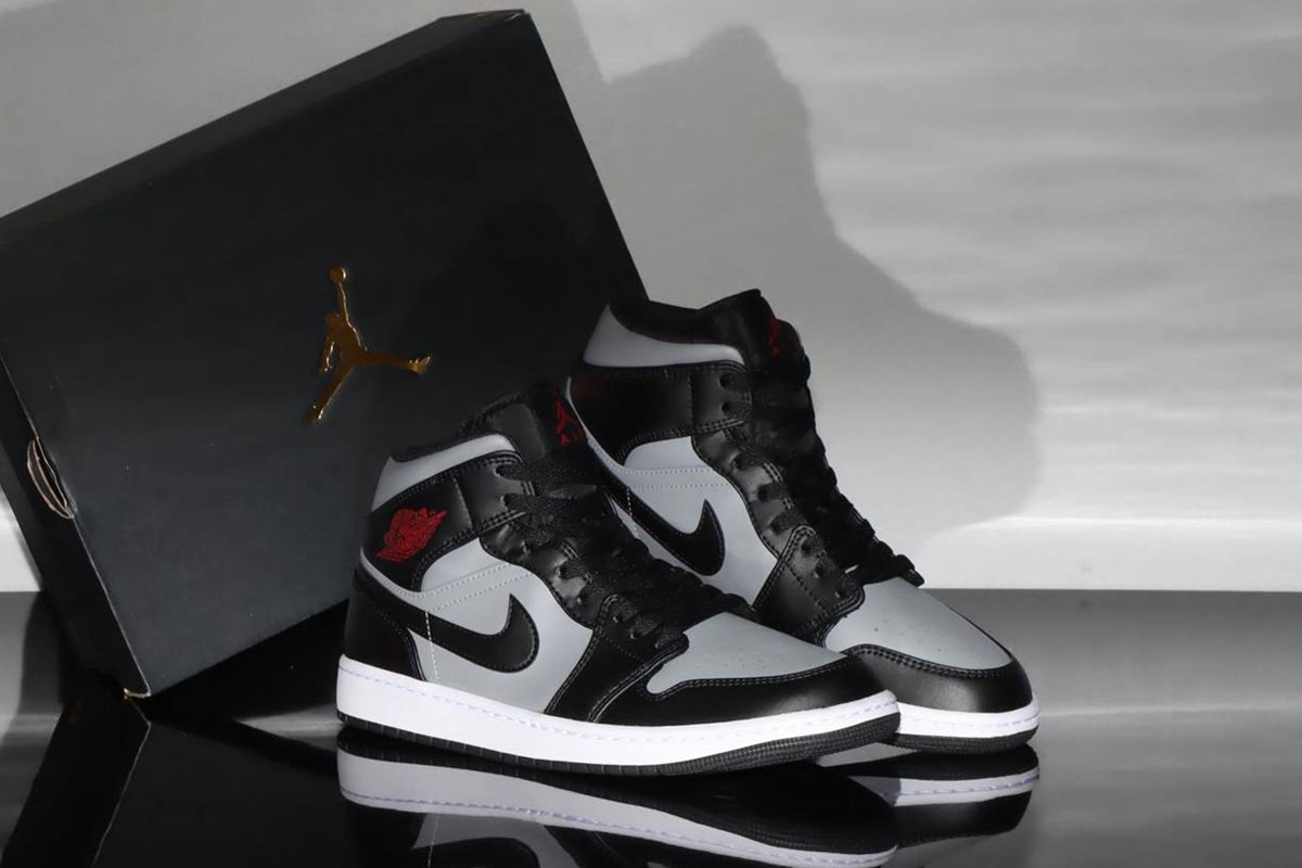 The Nike Air Jordan 1 Mid Shadow Black Gym Red Particle Grey
